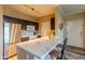 Bright, modern kitchen featuring a breakfast bar with white marble countertops and stainless steel appliances at 5345 E Van Buren St # 307, Phoenix, AZ 85008