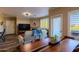 Bright, open living space with cozy seating, natural light, and a view of the neighborhood at 5345 E Van Buren St # 307, Phoenix, AZ 85008