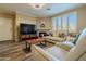 A cozy living room featuring natural lighting and plush seating at 5345 E Van Buren St # 307, Phoenix, AZ 85008