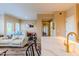A living room featuring natural light, with open access to dining and kitchen areas at 5345 E Van Buren St # 307, Phoenix, AZ 85008