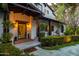 Charming home featuring an inviting entrance, exposed beams, and a well-manicured landscape at 5929 E Indian School Rd, Phoenix, AZ 85018