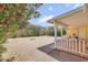 Charming backyard patio area with seating, surrounded by lush flowering bushes at 6102 E Inglewood St, Mesa, AZ 85205