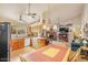 Inviting kitchen flows into a cozy living space with a fireplace and TV, perfect for entertaining at 6102 E Inglewood St, Mesa, AZ 85205