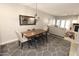 Cozy dining room seamlessly flows into the living area, creating an open and inviting living space at 7021 E Earll Dr # 204, Scottsdale, AZ 85251