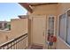Cozy condo entrance featuring a stylish door with a welcome mat and glass block window at 7021 E Earll Dr # 204, Scottsdale, AZ 85251