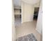 Inviting foyer showcases tiled floors and seamlessly connects to the kitchen and dining areas at 7021 E Earll Dr # 204, Scottsdale, AZ 85251