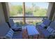 Relaxing outdoor patio with comfortable seating and a view of the surrounding landscape at 7021 E Earll Dr # 204, Scottsdale, AZ 85251