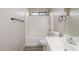 Bright bathroom featuring a tub, shower, and a neutral color palette at 7319 S 56Th Dr, Laveen, AZ 85339