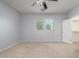 Bright bedroom featuring ceiling fan and window at 7319 S 56Th Dr, Laveen, AZ 85339