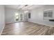 Dining room with a modern light fixture and large windows that let in natural light at 7319 S 56Th Dr, Laveen, AZ 85339