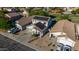 Aerial view of a home with desert landscaping, solar panels, two-car garage, and inviting curb appeal at 7319 S 56Th Dr, Laveen, AZ 85339