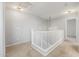 Upstairs hallway featuring neutral paint and carpeted floors at 7319 S 56Th Dr, Laveen, AZ 85339