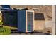 Aerial shot of a roof featuring solar panels for energy efficiency and a low-maintenance yard at 7319 S 56Th Dr, Laveen, AZ 85339