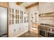 Spacious pantry with glass-front cabinets and marble countertops at 7530 N Via De La Siesta --, Scottsdale, AZ 85258