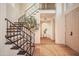 Elegant staircase with black iron railing and natural light at 7530 N Via De La Siesta --, Scottsdale, AZ 85258