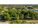 Expansive aerial view showcases the mature landscaping surrounding the property at 8302 S Jentilly Ln, Tempe, AZ 85284