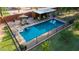 Aerial view of the private backyard pool and lounge area, perfect for relaxation and fun at 8302 S Jentilly Ln, Tempe, AZ 85284