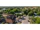 Expansive aerial view showcases the mature landscaping, neighborhood and mountain views at 8302 S Jentilly Ln, Tempe, AZ 85284
