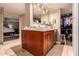 Bathroom featuring dual sinks, granite countertops, and natural light at 8302 S Jentilly Ln, Tempe, AZ 85284