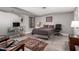 Basement bedroom with gray walls, carpet flooring, and modern decor at 8302 S Jentilly Ln, Tempe, AZ 85284