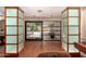 Inviting entryway with hardwood floors, frosted glass accents, and abundant natural light at 8302 S Jentilly Ln, Tempe, AZ 85284