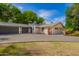 Lovely single-story home featuring a three-car garage and paved driveway with well-maintained lawn at 8302 S Jentilly Ln, Tempe, AZ 85284