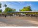 Well-maintained horse stables and equestrian facilities provide a comfortable environment for the animals at 8302 S Jentilly Ln, Tempe, AZ 85284
