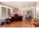 Office space featuring hardwood floors and views of the dining room at 8302 S Jentilly Ln, Tempe, AZ 85284