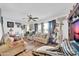Comfortable living room with couches and large windows allowing natural light at 919 E Villa Maria Dr, Phoenix, AZ 85022