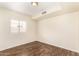 This bedroom features natural lighting with wood flooring at 937 N Marble St, Gilbert, AZ 85234