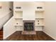 Stylish fireplace and built-in shelving in a well-lit living room at 937 N Marble St, Gilbert, AZ 85234
