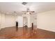 This living room has a fireplace and hardwood floors with a large entryway space at 937 N Marble St, Gilbert, AZ 85234