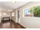 Bright living space with hardwood floors, several windows, and natural light at 937 N Marble St, Gilbert, AZ 85234