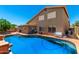 Backyard pool offers space for outdoor activities, relaxation, and fun in the sun at 937 N Marble St, Gilbert, AZ 85234