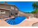 A refreshing private pool with surrounding concrete deck offers respite from the desert heat at 937 N Marble St, Gilbert, AZ 85234