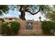 Community entrance sign with stone accents and lush landscaping, welcoming residents and visitors at 9450 E Becker Ln # 2099, Scottsdale, AZ 85260