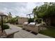 Outdoor grilling area with built-in grills and concrete table, perfect for community gatherings at 9450 E Becker Ln # 2099, Scottsdale, AZ 85260