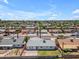 Aerial view of a home with a fenced backyard, palm trees, and residential neighborhood at 1020 E Concorda Dr, Tempe, AZ 85282