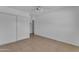 Bedroom featuring closet, doorway and ceiling fan at 1020 E Concorda Dr, Tempe, AZ 85282