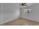 Bedroom featuring ceiling fan and view of outside at 1020 E Concorda Dr, Tempe, AZ 85282