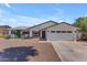 Charming single-story home featuring a well-maintained front yard and attached garage at 1020 E Concorda Dr, Tempe, AZ 85282