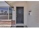 Close-up of the front door of a home with brick accents and a mailbox at 1020 E Concorda Dr, Tempe, AZ 85282
