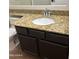 Bathroom with dark wood vanity and granite counters at 1040 W Juniper Ave, Gilbert, AZ 85233
