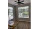 Bright dining area with large windows and an attached kitchen bar, perfect for casual meals at 1040 W Juniper Ave, Gilbert, AZ 85233
