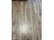 An up close shot of the wooden-look flooring at 1040 W Juniper Ave, Gilbert, AZ 85233