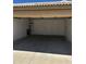Spacious, empty two-car garage, ready for parking and storage at 1040 W Juniper Ave, Gilbert, AZ 85233