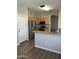 An eat-in kitchen featuring stainless steel appliances, wood cabinets, and granite countertops at 1040 W Juniper Ave, Gilbert, AZ 85233