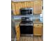 An eat-in kitchen featuring stainless steel appliances, wood cabinets, and granite countertops at 1040 W Juniper Ave, Gilbert, AZ 85233