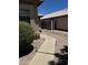 A view of the side yard featuring low-maintenance landscaping and walkway at 1040 W Juniper Ave, Gilbert, AZ 85233