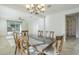 Spacious dining room with ample natural light and an open-concept design for seamless entertaining at 10609 E Durant Dr, Mesa, AZ 85212